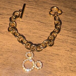 Disney Gold Chain Bracelet with Crystal Mickey Accents. Mickey toggle closure.